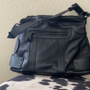 black Wilson’s leather bag